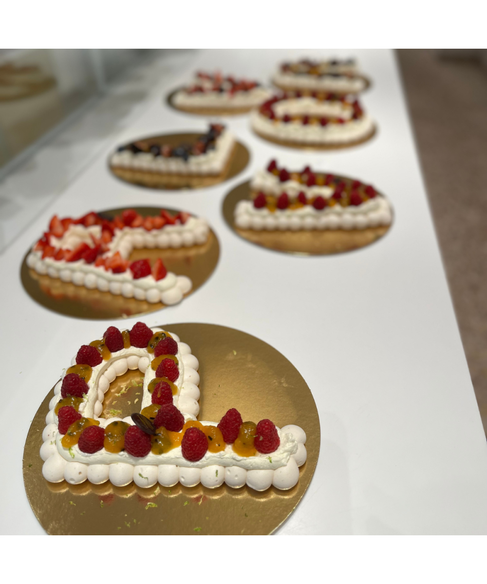 Letter cake in pavlova